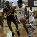 Skyline High School senior Sharath Anand drives toward the rim in the first half of the game against Windsor Catholic Central on Saturday. Daniel Brenner I AnnArbor.com